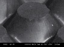 IMAGE 4: A single dot, at 250X shows the flat-topped dot profile, sharp bevel, and relief depth available with this patent-pending digital plate technology.
